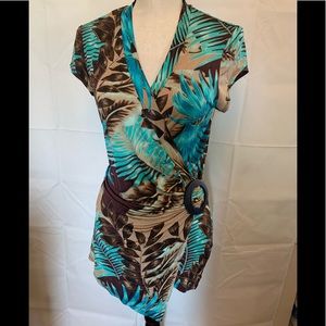 CACHE top. Wrap around look. Cute with jeans or leggings.